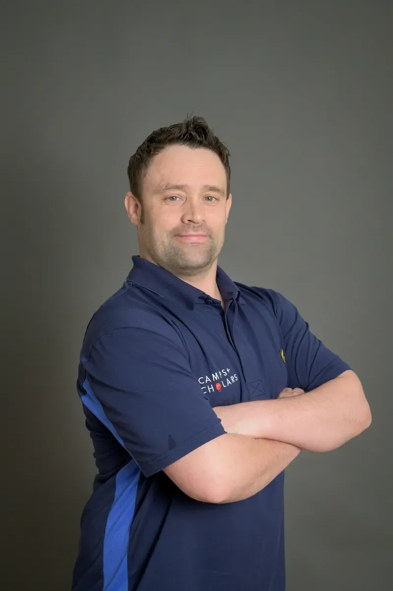 Simon, member of the Scamps & Scholars team